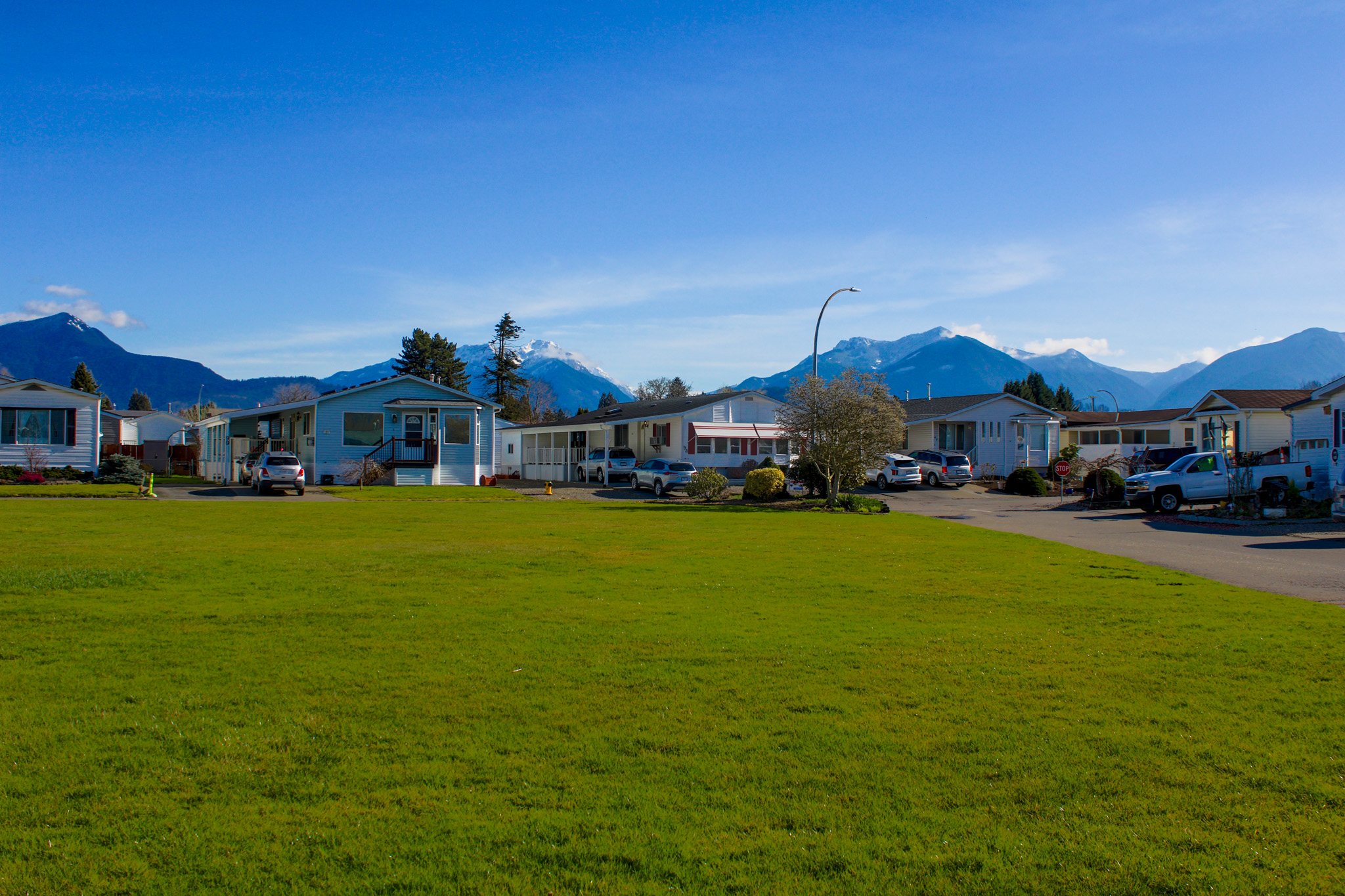 This view shows the grassy landscaping at Rainbow Estates in Chilliwack BC