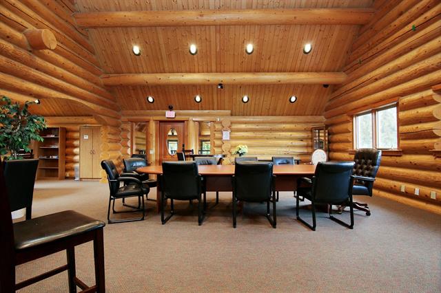 image shows the board room table at The Cottages at Bridal Falls 53480 Bridal Falls Road