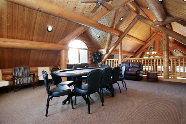 image shows poker table in the loft of the clubhouse at The Cottages at Bridal Falls 53480 Bridal Falls Road