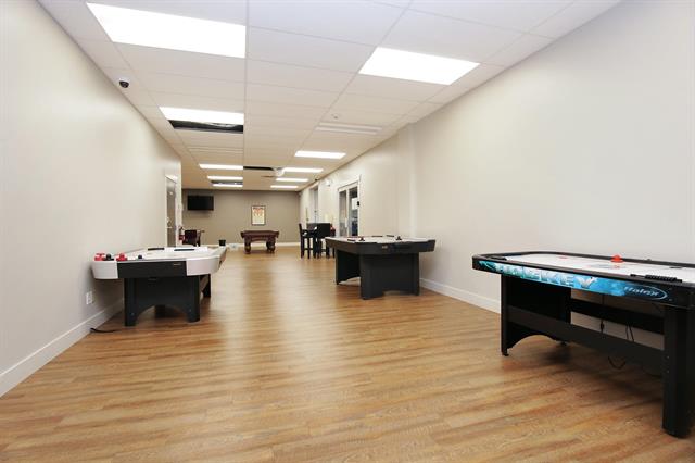 image shows the games room in the clubhouse at The Cottages at Bridal Falls 53480 Bridal Falls Road