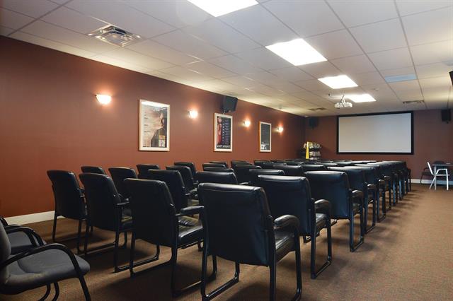 image shows the movie theatre in the clubhouse at The Cottages at Bridal Falls 53480 Bridal Falls Road